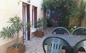 Maison coeur de ville avec cour et jardin intime